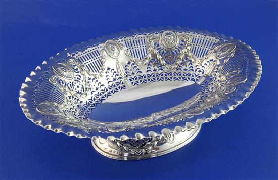 A Victorian pierced silver oval pedestal fruit bowl, 11.5 oz.